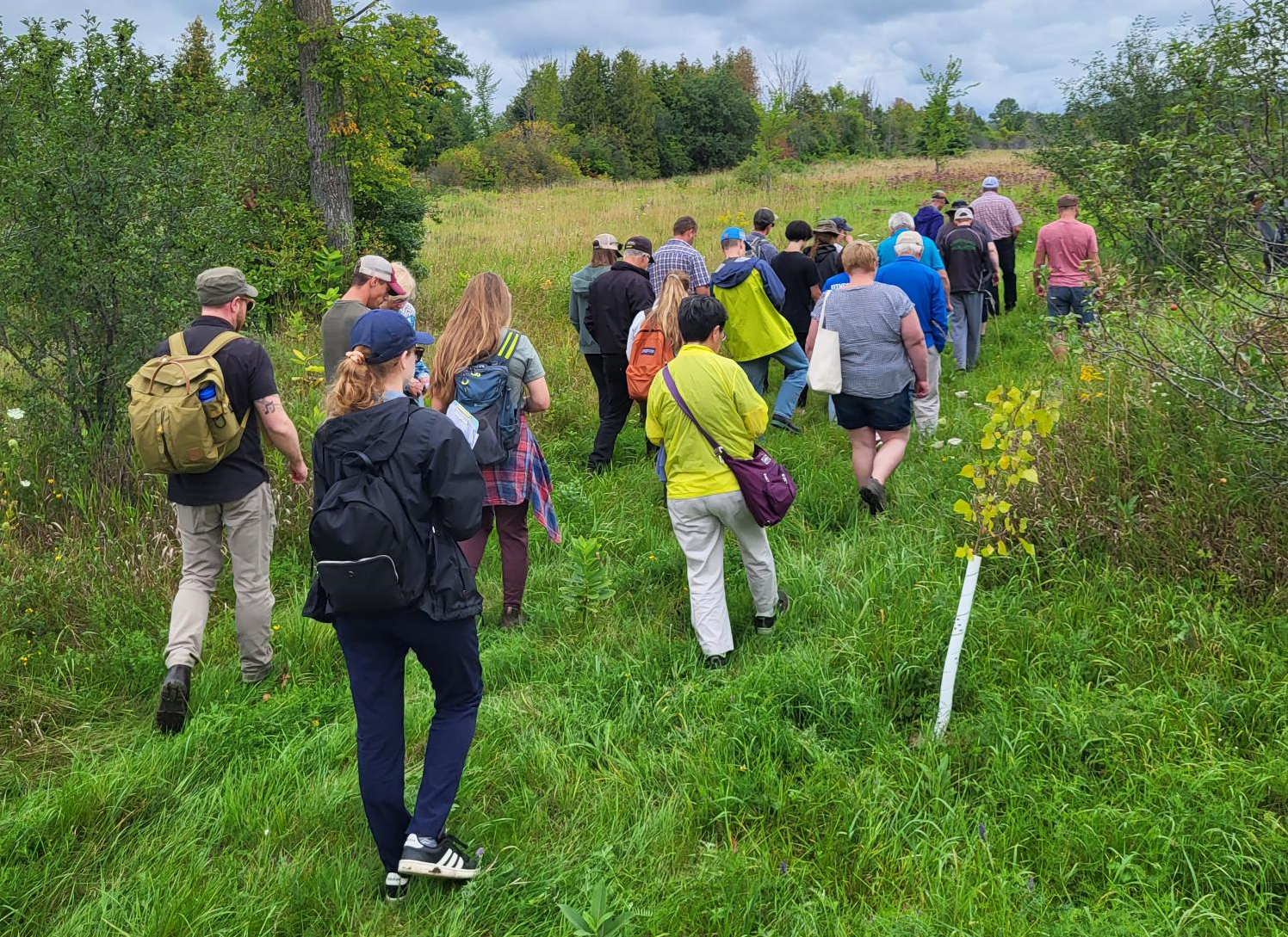 A group of Talbot River Subwatershed Farm Tour participants gather to hear one of the guest speakers.