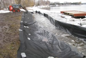 silt fence and erosion protection along shoreline in the winter